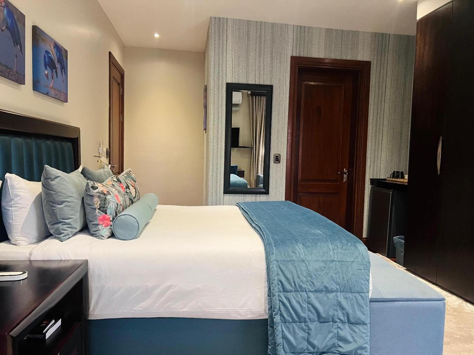 One O Eight Boutique Hotel ベノニ 部屋 写真